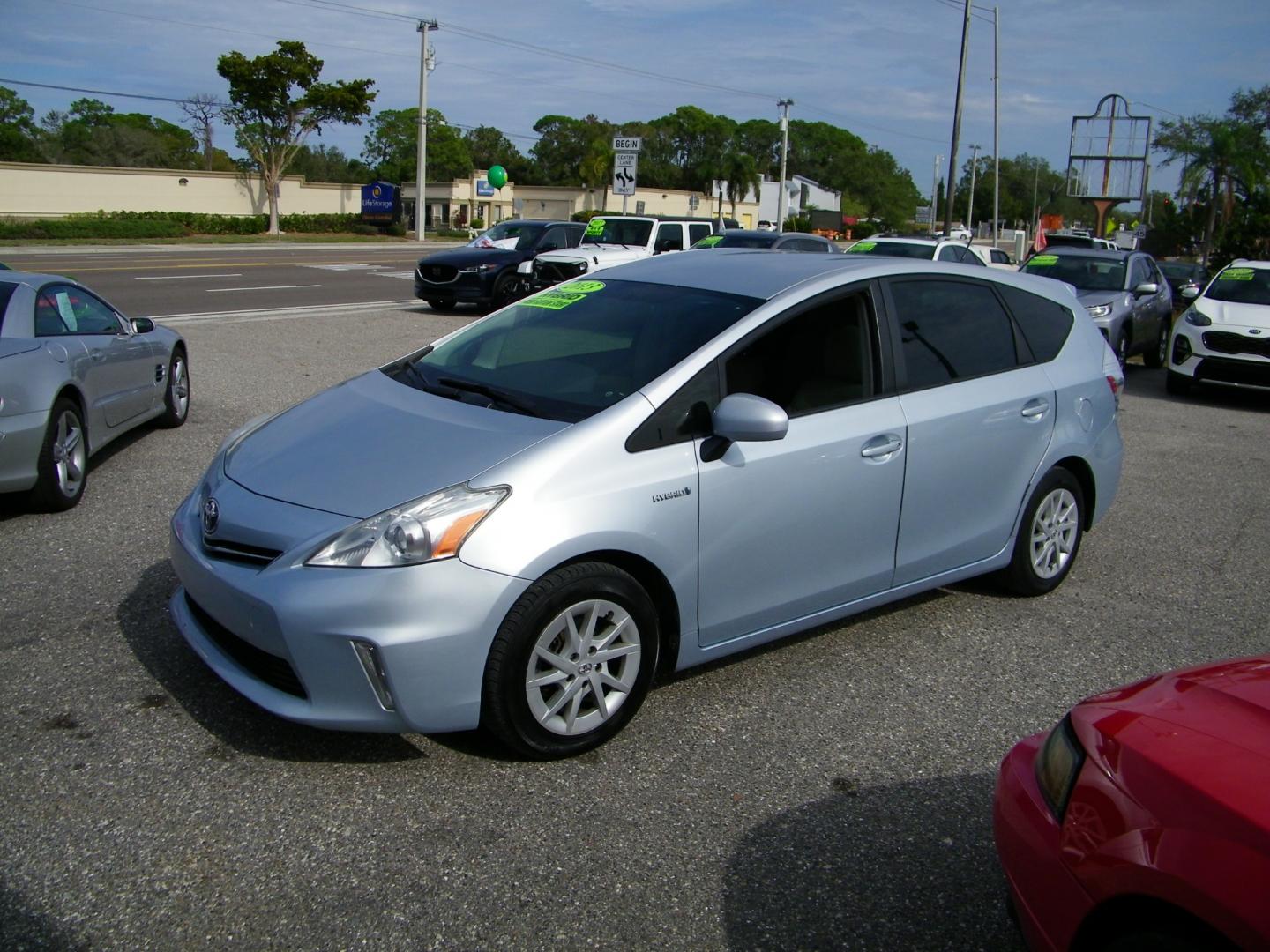 2013 Silver /Beige Toyota Prius V Three (JTDZN3EU5D3) with an 1.8L L4 DOHC 16V HYBRID engine, Continuously Variable Transmission transmission, located at 4000 Bee Ridge Road, Sarasota, FL, 34233, (941) 926-0300, 27.298664, -82.489151 - Photo#1